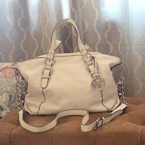 Large white leather Michael Kor bag.
